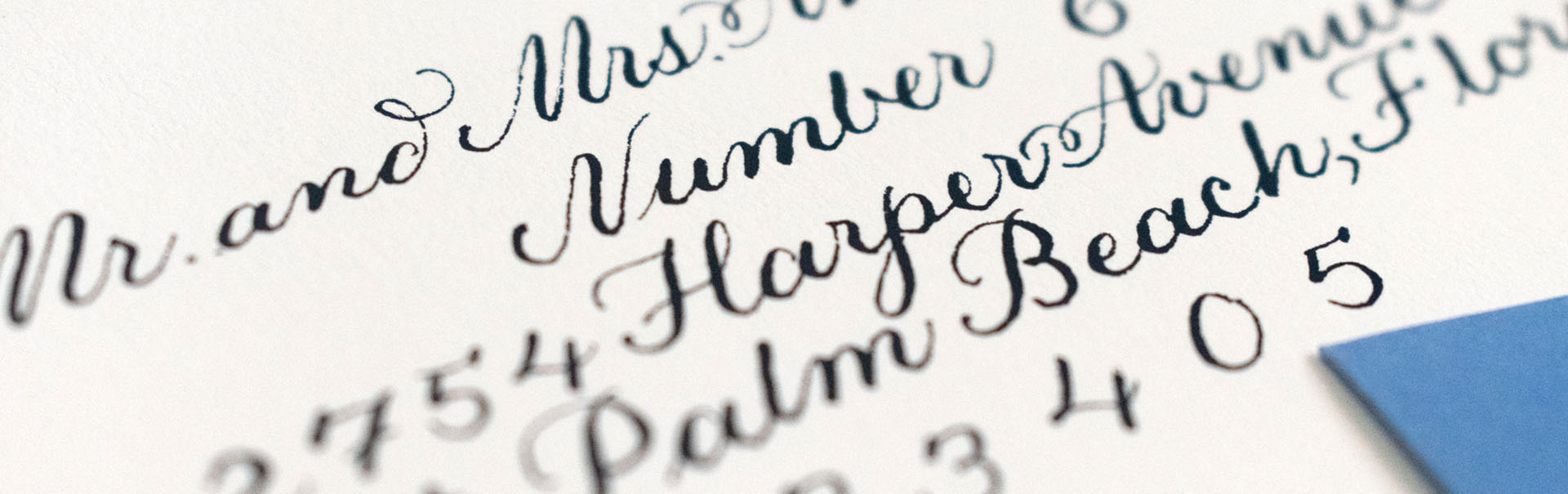Black calligraphy on white envelopes